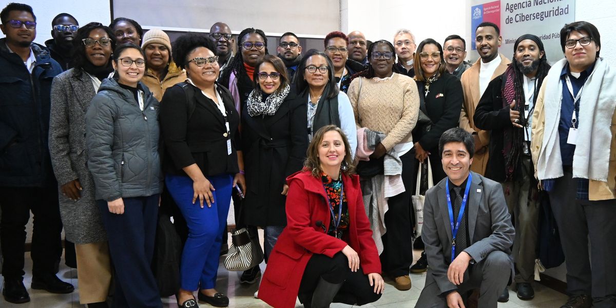 Delegación del Caribe y personal AGCID durante su visita a la ANCI.